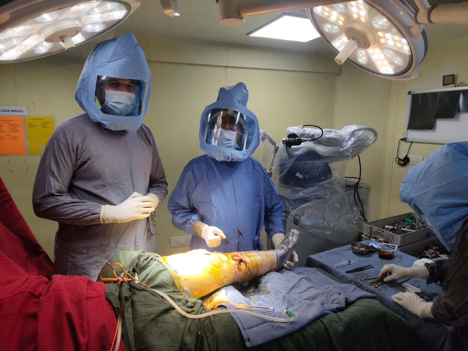 Dr. Milind Patil, Dr. Rushikesh Abhyankar and Dr. Rajendra Abhyankar with joint replacement models at Revival Bone and Joint Hospital